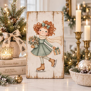 Whimsical Christmas ice-skating girl transfer on a rustic wooden sign.